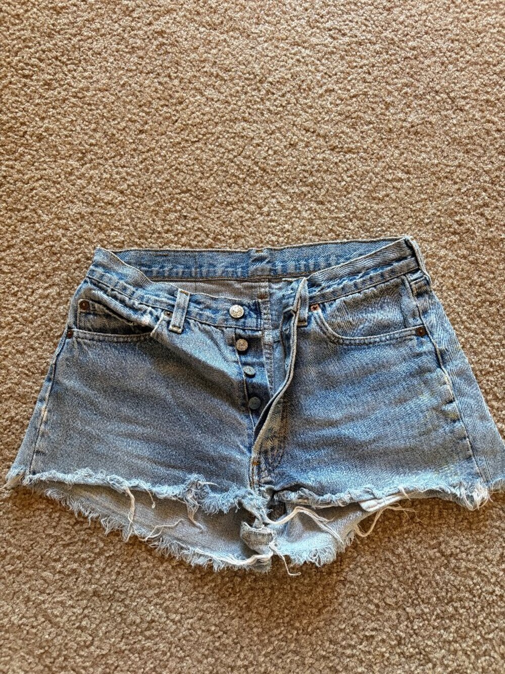 Levi's distressed jean short-shorts, size small/26